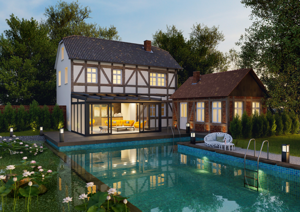 Ein Wintergarten als zeitlose Schönheit und harmonische Verbindung nach draußen, der sich perfekt in die Architektur eines klassischen Fachwerkhauses integriert.